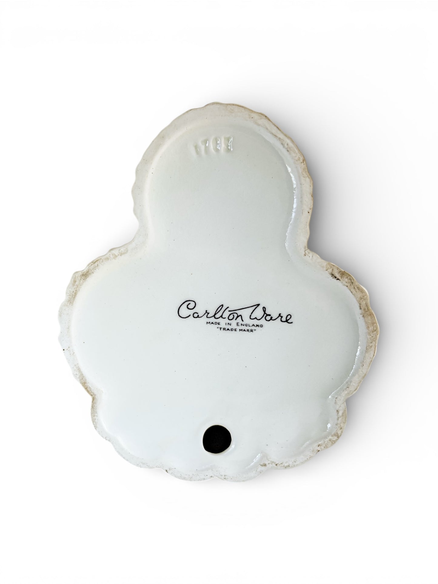 Bottom of vintage Carlton Ware white porcelain piece with embossed number 1734 and maker's mark