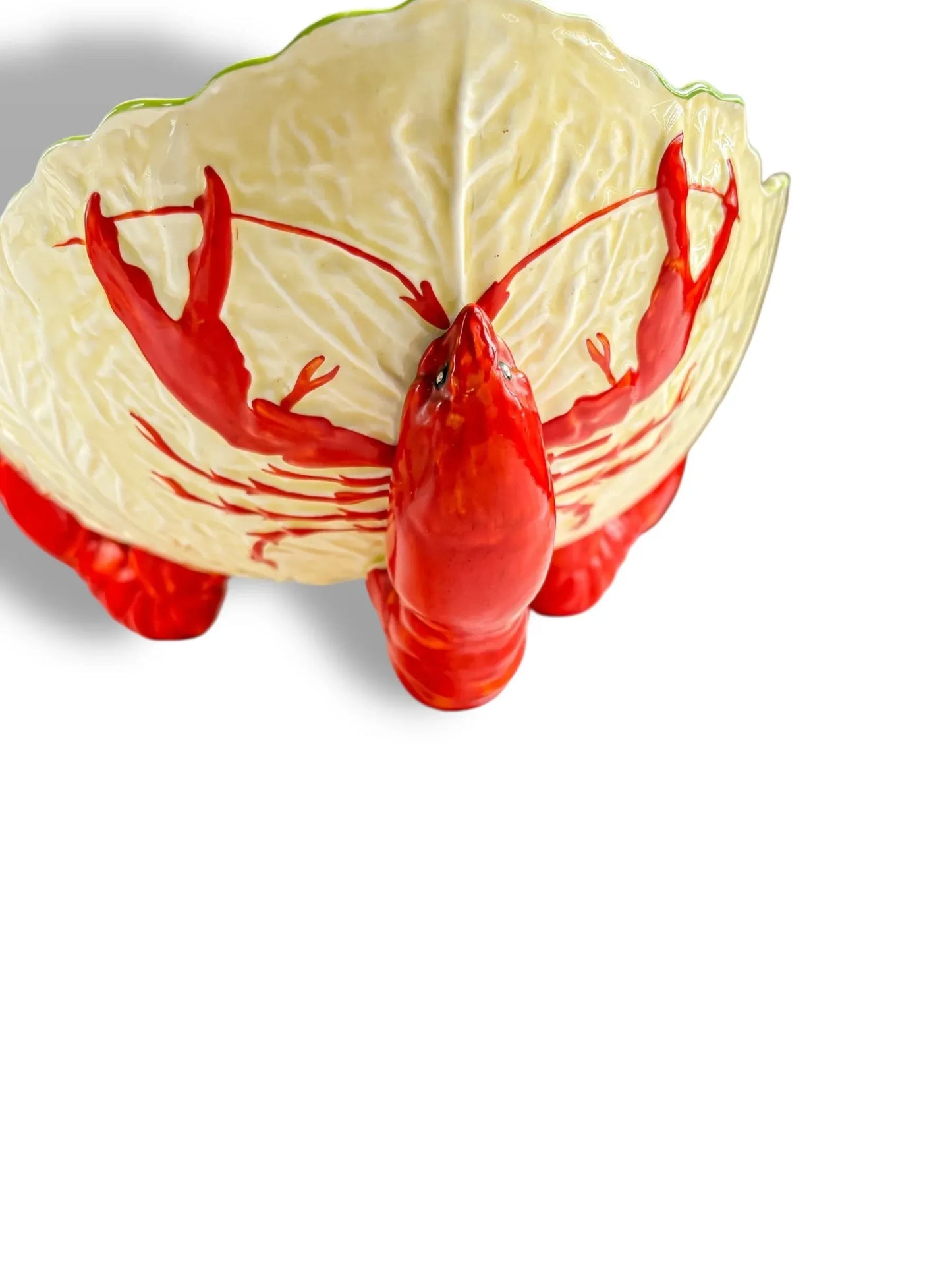 Ceramic bowl shaped and painted like a red lobster with detailed claws and shell pattern