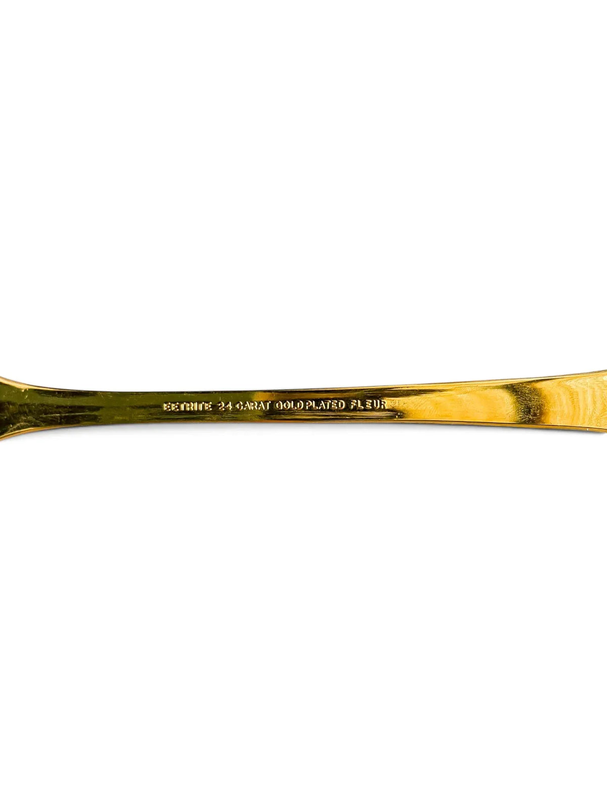 Close-up of the reverse handle stamp reading Eetrite 24 Carat Gold Plated Fleur