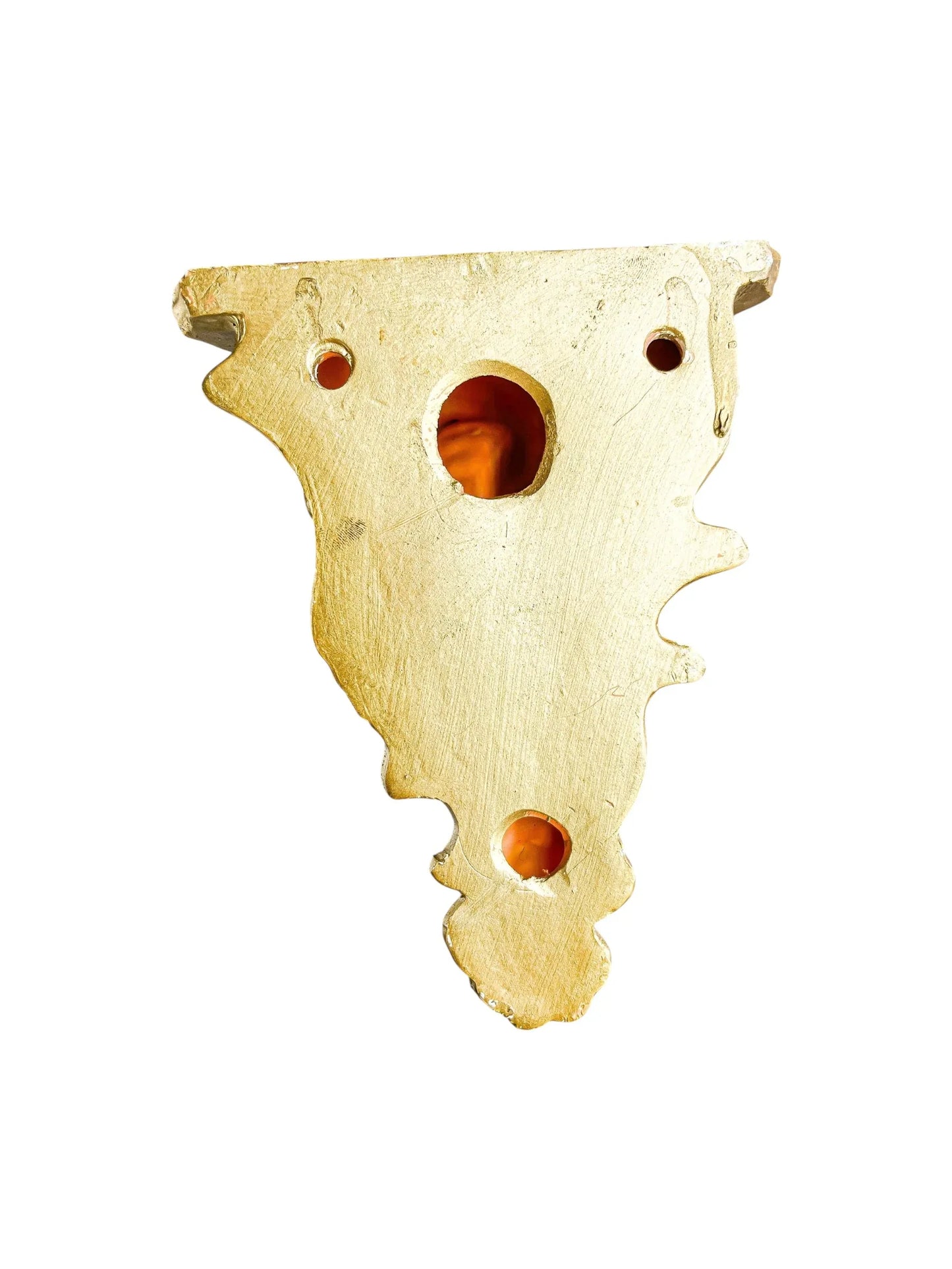 Vintage brass tableware accent piece with ornate cutouts on white background