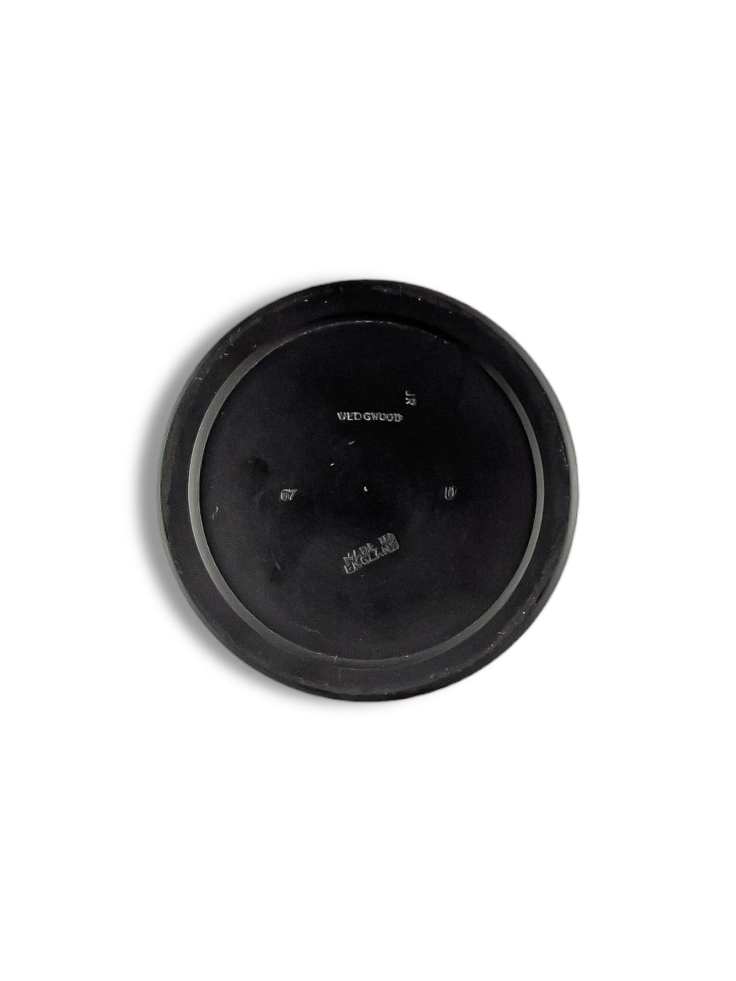 Bottom view of black Wedgwood ceramic plate marked Made in England with stamped details