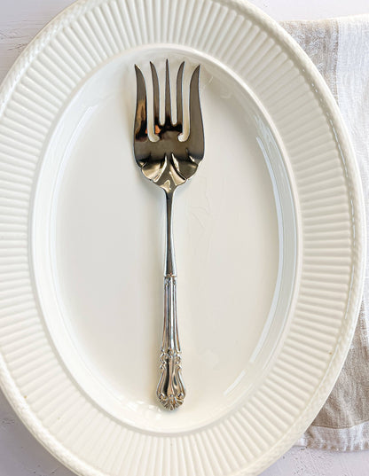 Elegant Silver-Plated Serving Fork with Ornate Handle Design