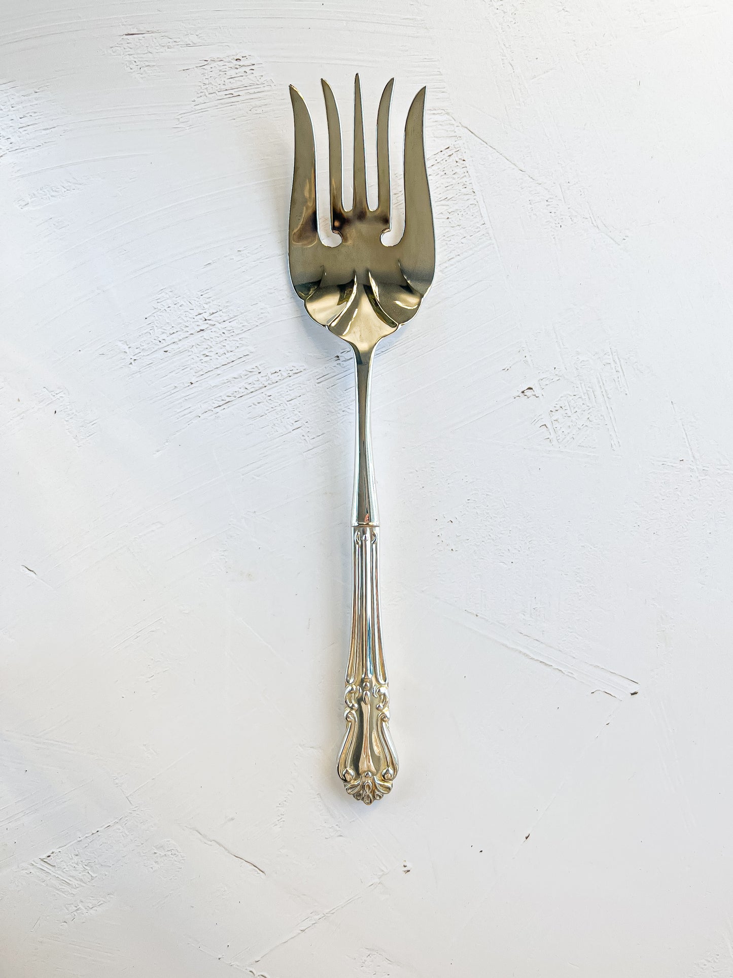 Elegant Silver-Plated Serving Fork with Ornate Handle Design