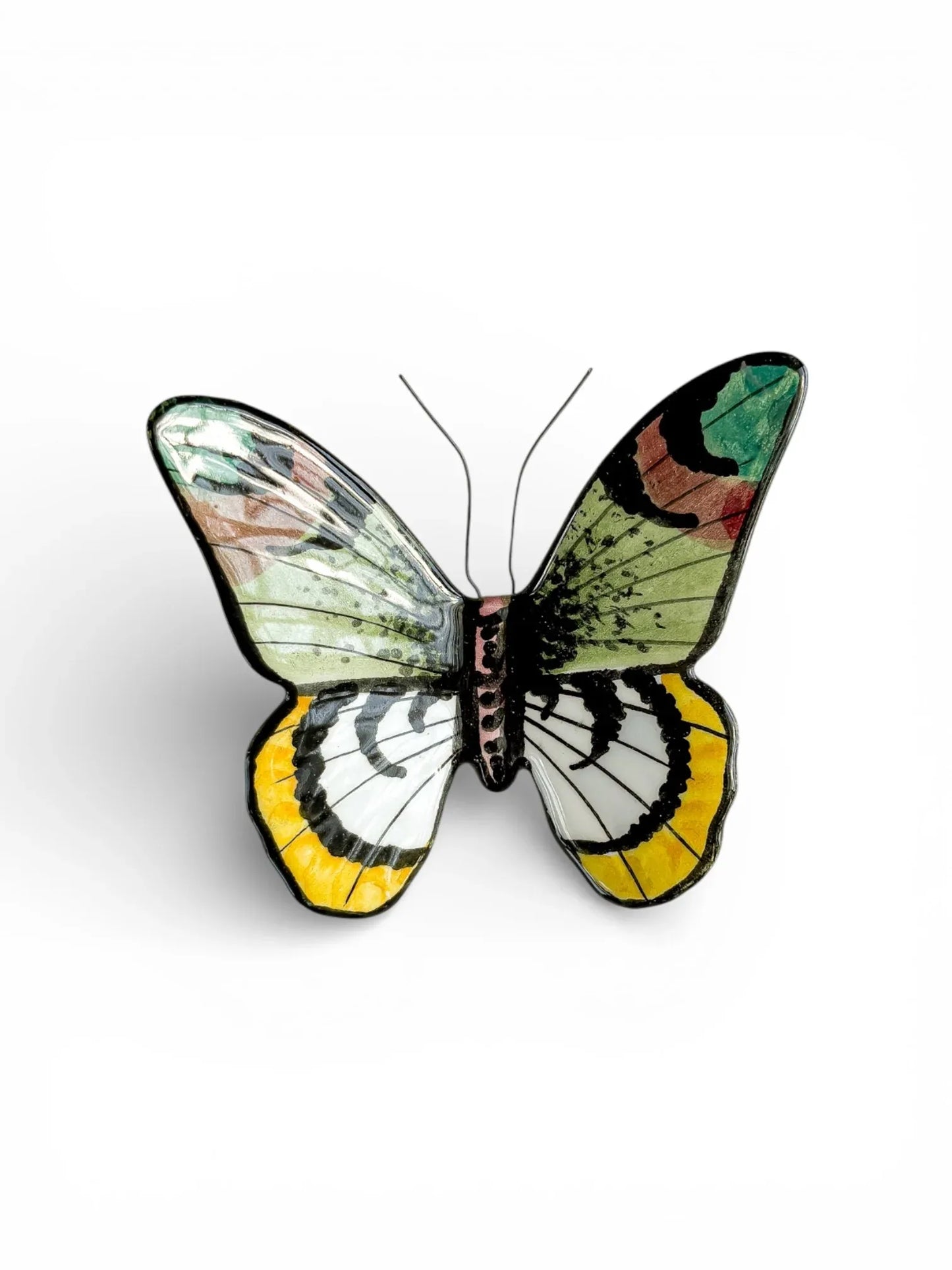 Hand-painted porcelain butterfly figurine with yellow, black, and green wings on white background