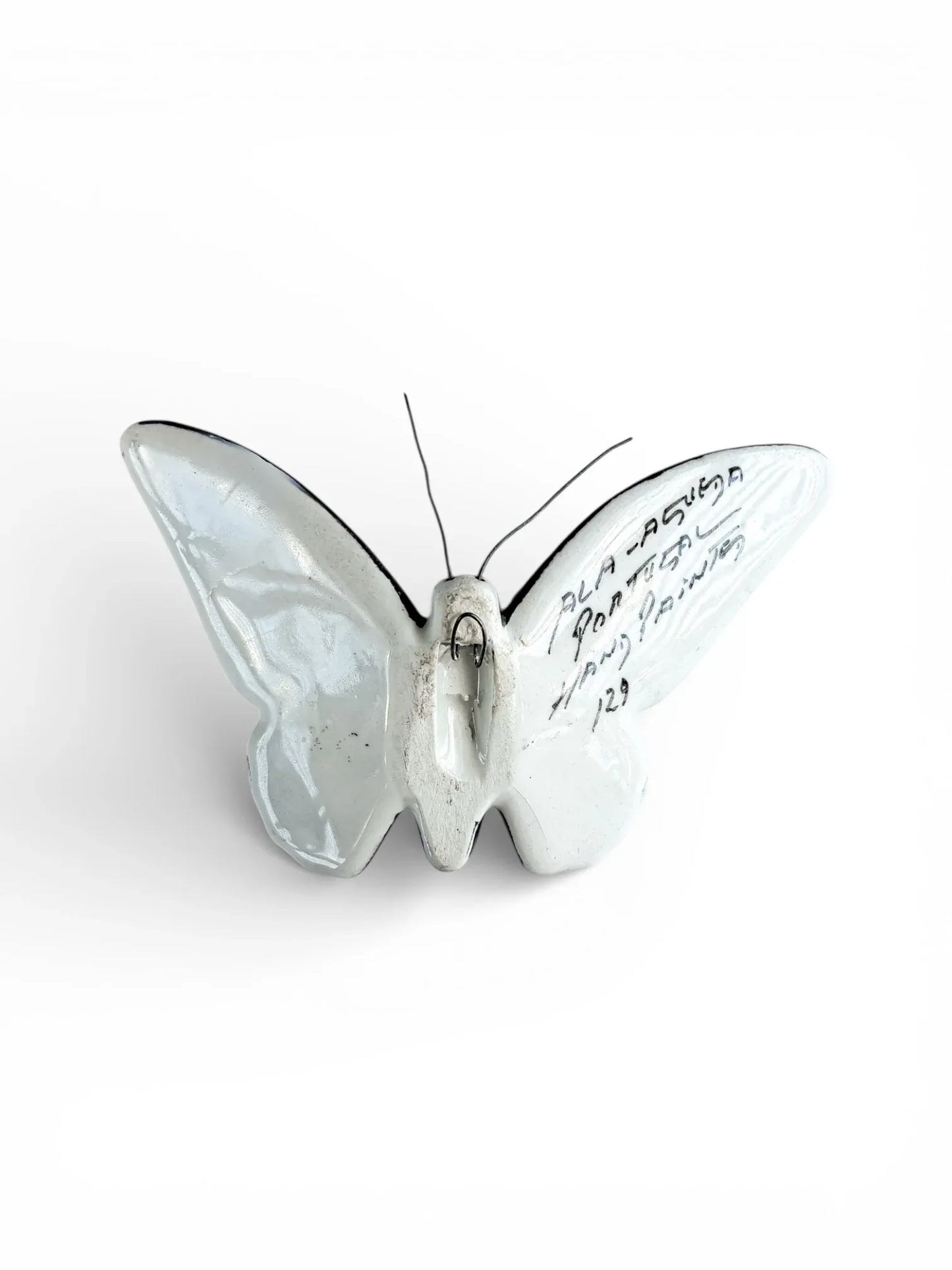 Porcelain butterfly figurine with handwritten text, vintage ceramic collectible