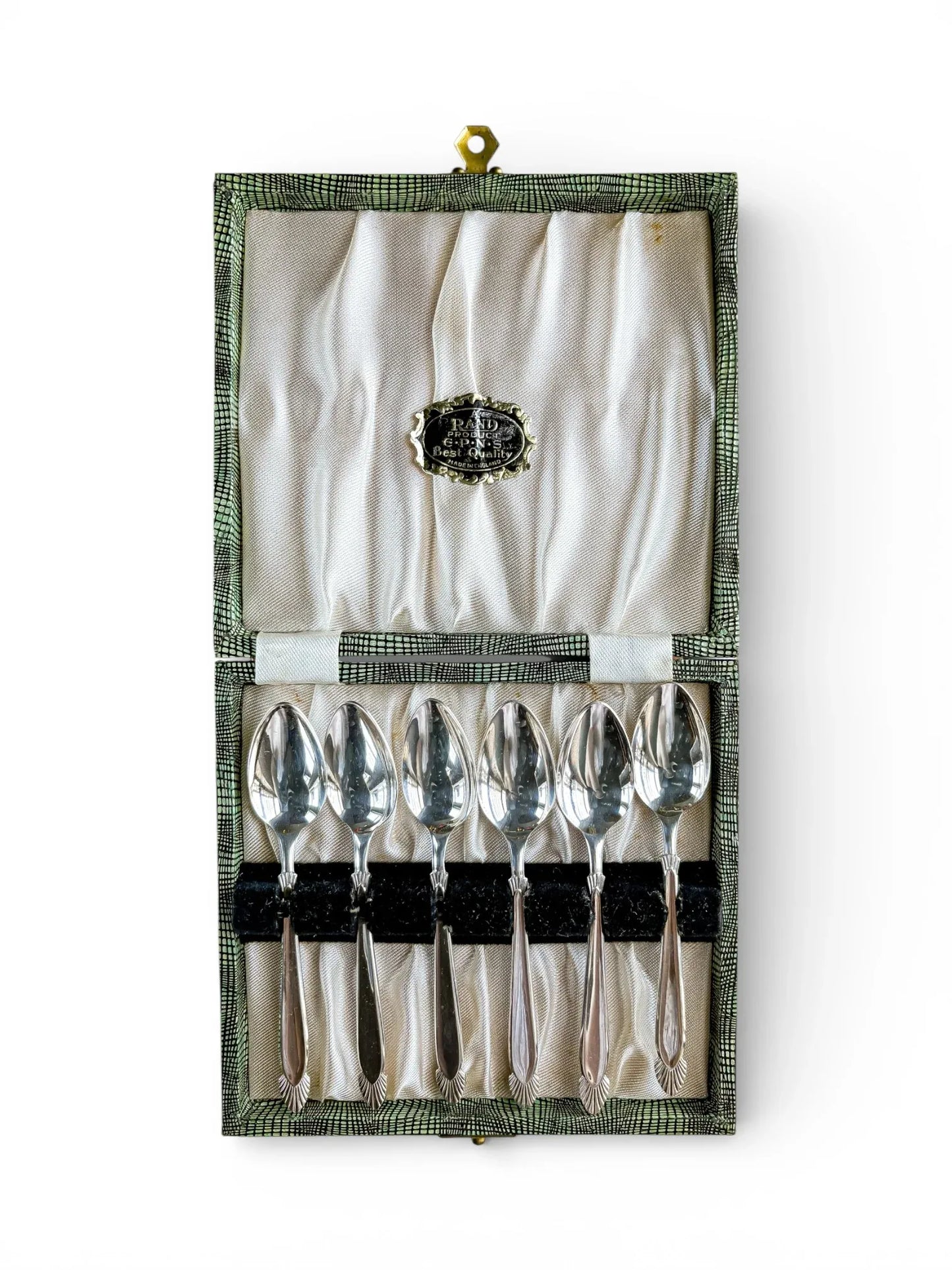 Vintage silver teaspoons set in ornate display box, ideal collectible tableware