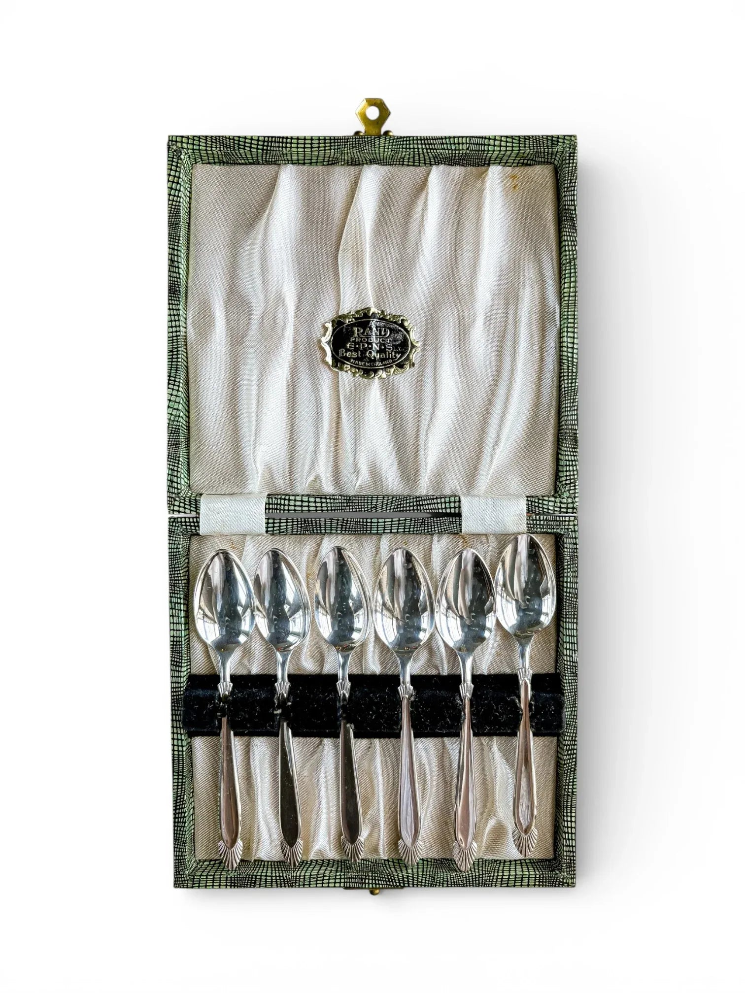 Vintage silver teaspoons set in ornate display box, ideal collectible tableware