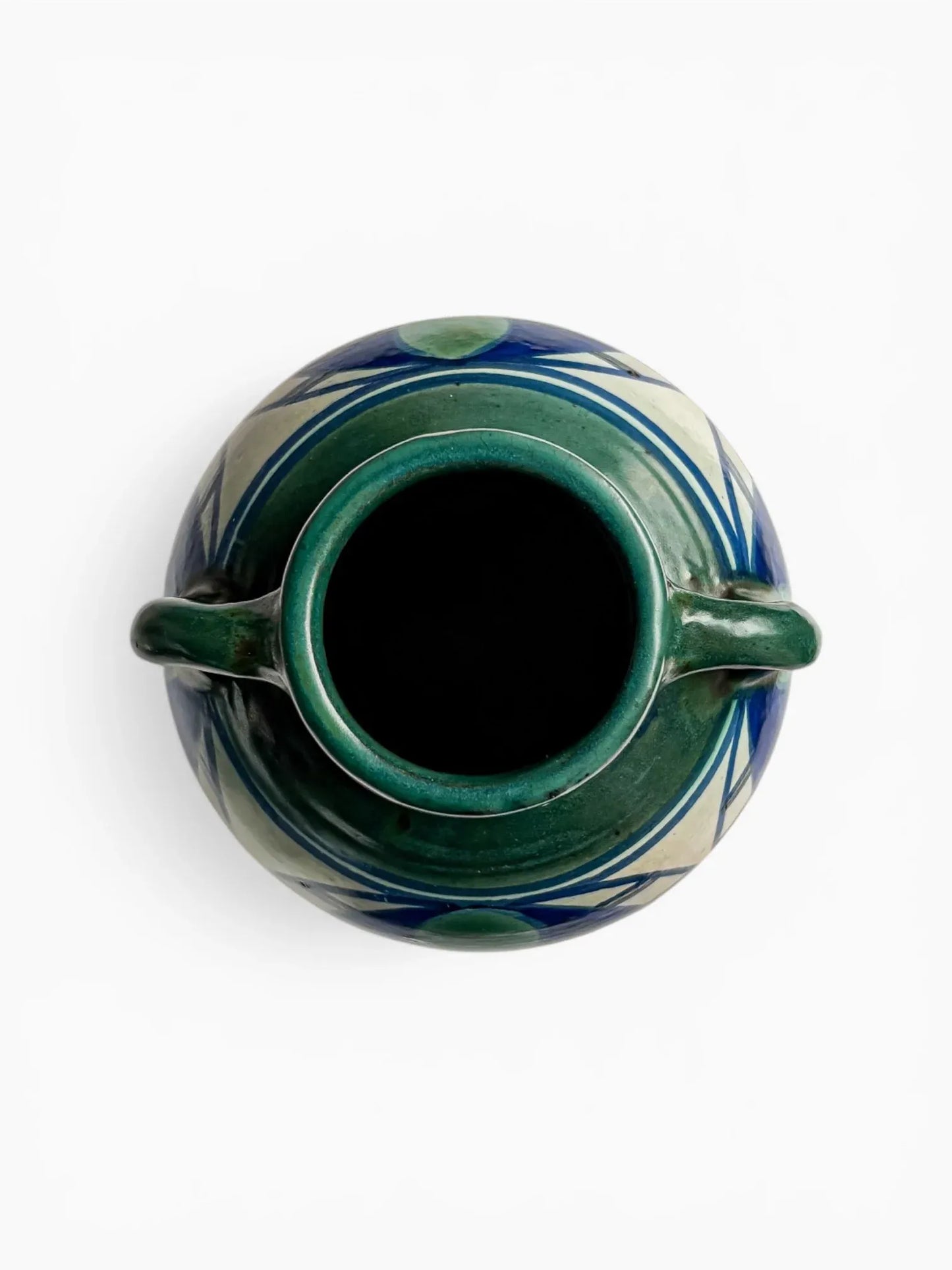 Top-down view of an Art Nouveau Gouda vase showing the flared green rim and symmetrical circular form, emphasizing the clean lines and well-preserved high-glaze finish.