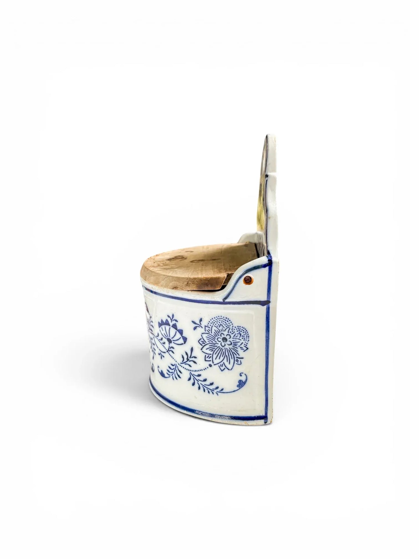 Right side profile of the antique German stoneware Mehl box, showing its flat back, curved front basin, and hinged wooden lid assembly on a white background.