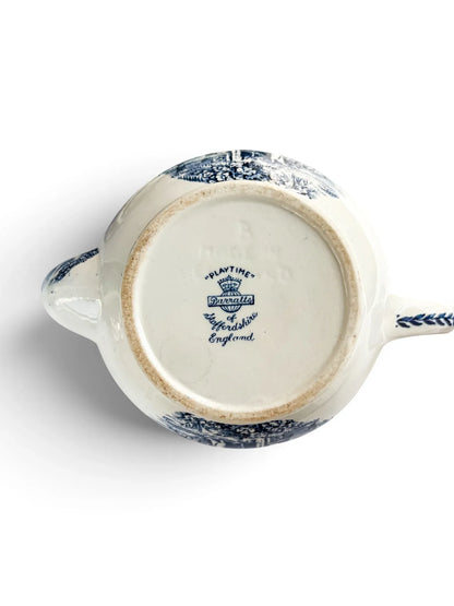 Base of the teapot with Barratts of Staffordshire England backstamp, crown mark and the pattern name Playtime.