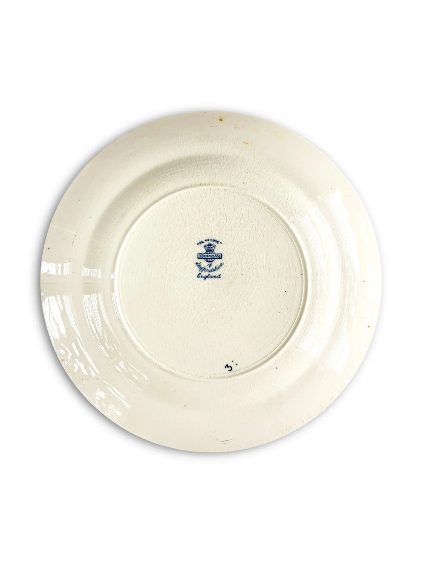 Vintage ceramic plate with blue ironstone edgeware mark from England, showing crackled glaze