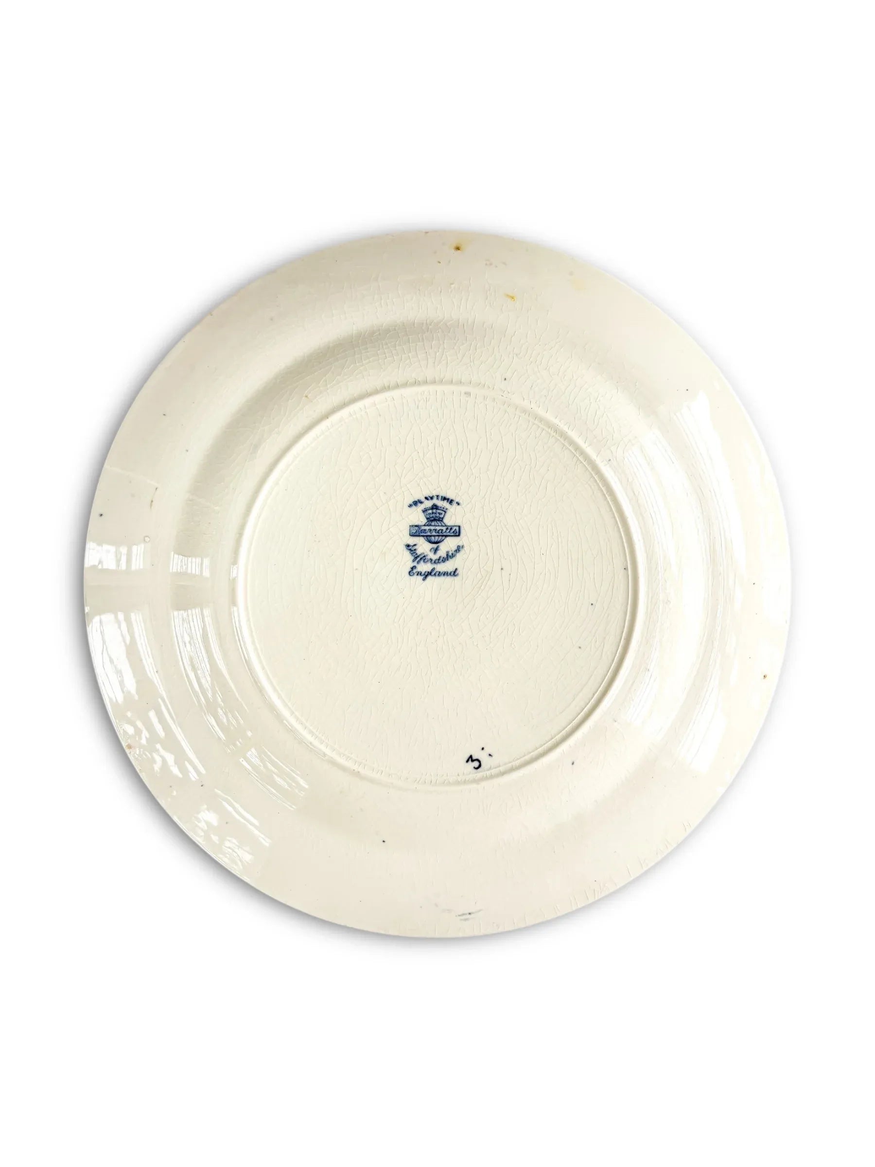 Vintage ceramic plate with blue ironstone edgeware mark from England, showing crackled glaze