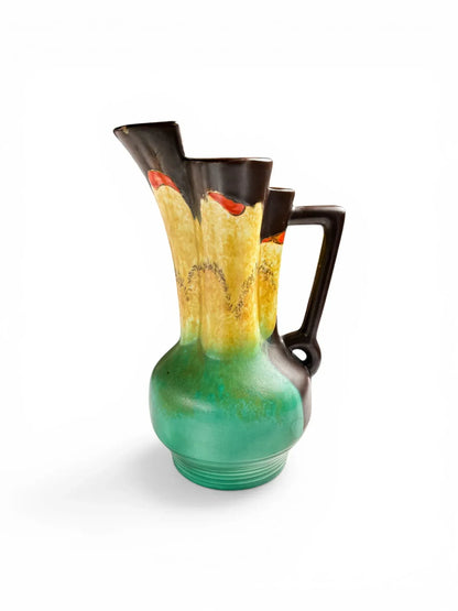 Beswick Ware Art Deco Sunrise jug, Shape 177/1, featuring a green base transitioning to a yellow and orange dapple glaze with a stepped rim.