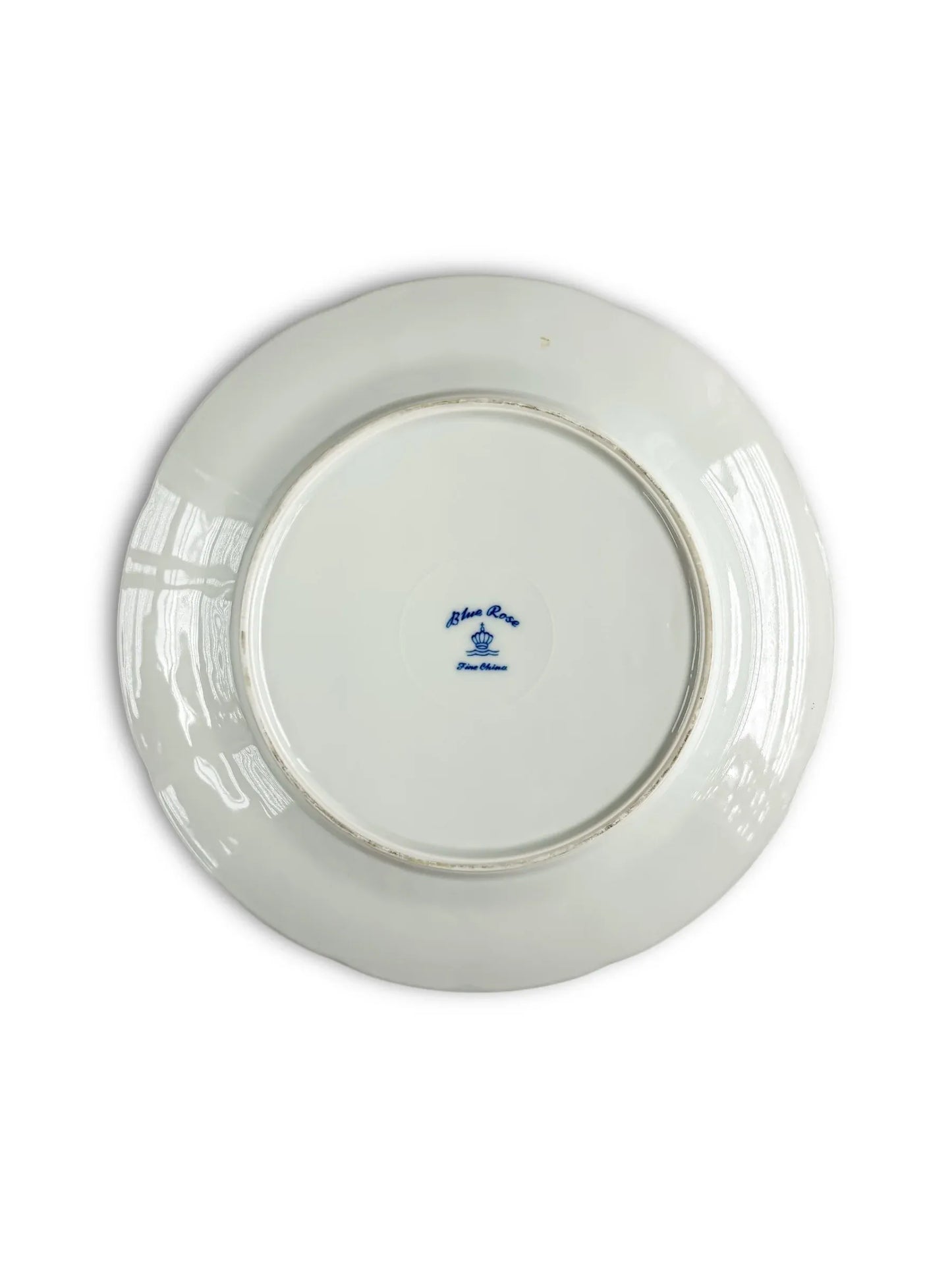 Back of white porcelain plate with Blue Rose Fine China mark on white background