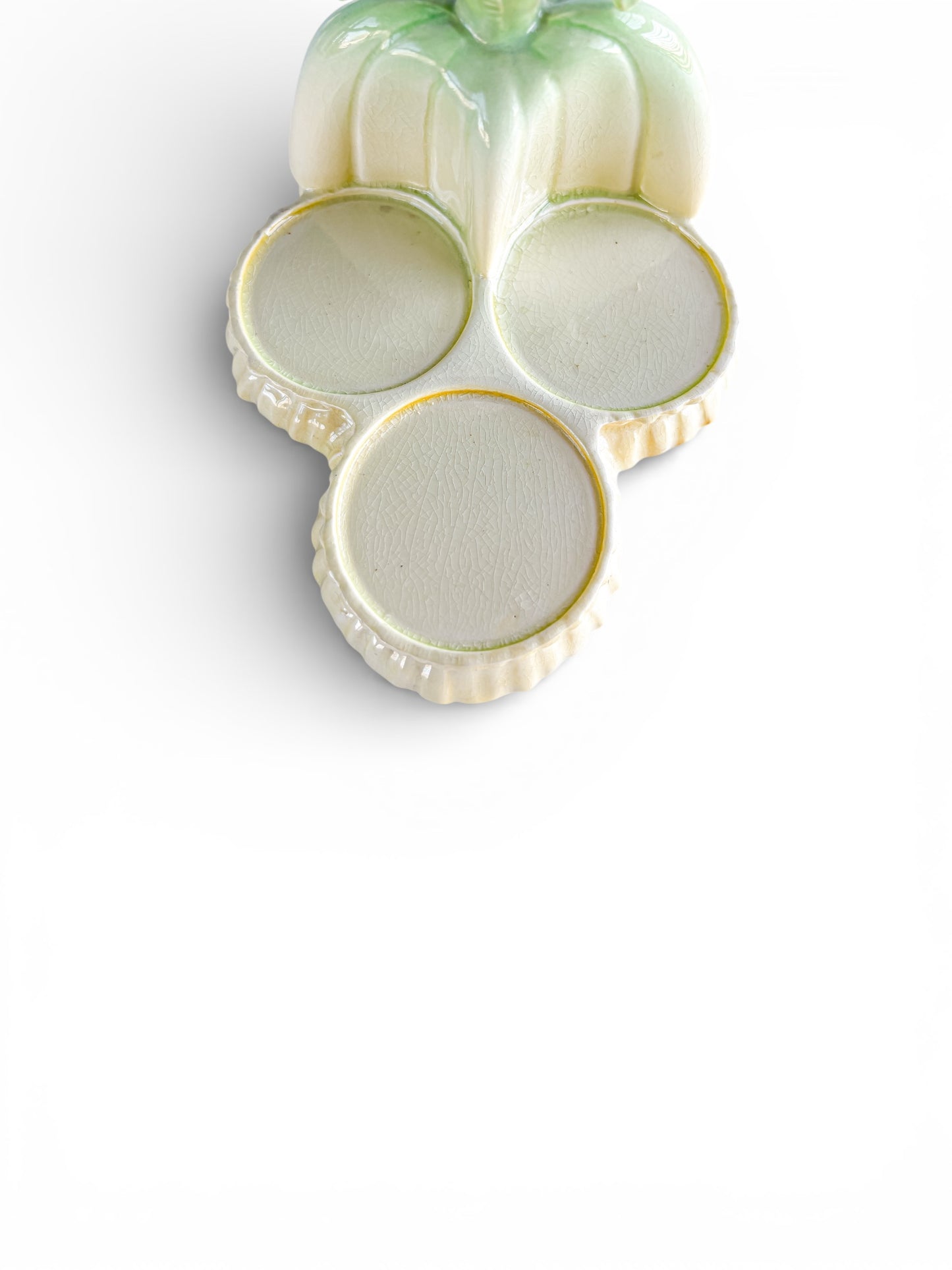 Vintage tri-section ceramic serving dish with green and cream glaze, showing crackle detail