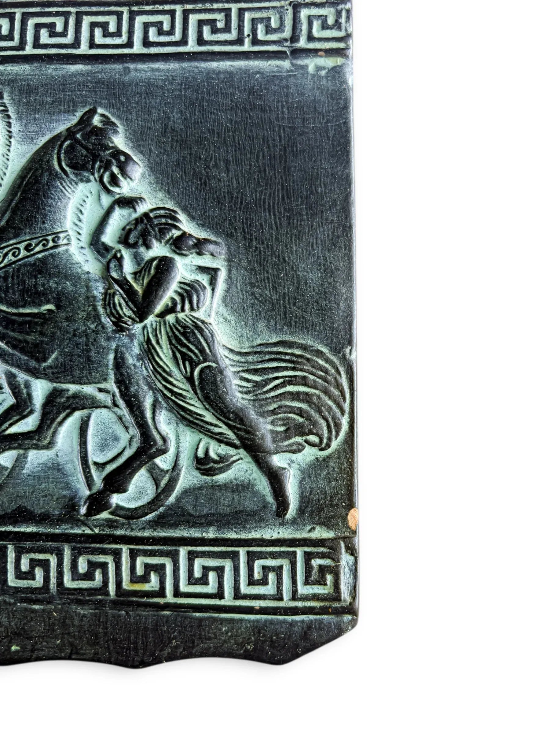 Vintage ceramic tile with Greek key border and embossed horse and figure design