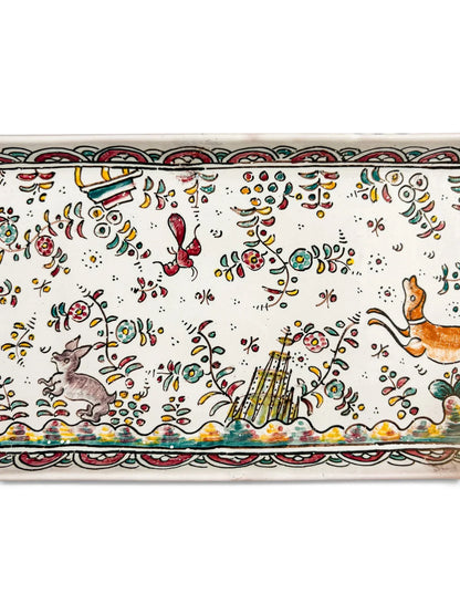 Detail of hand-painted hare, small building and flowers on Conimbriga SEC.XVII faience tray