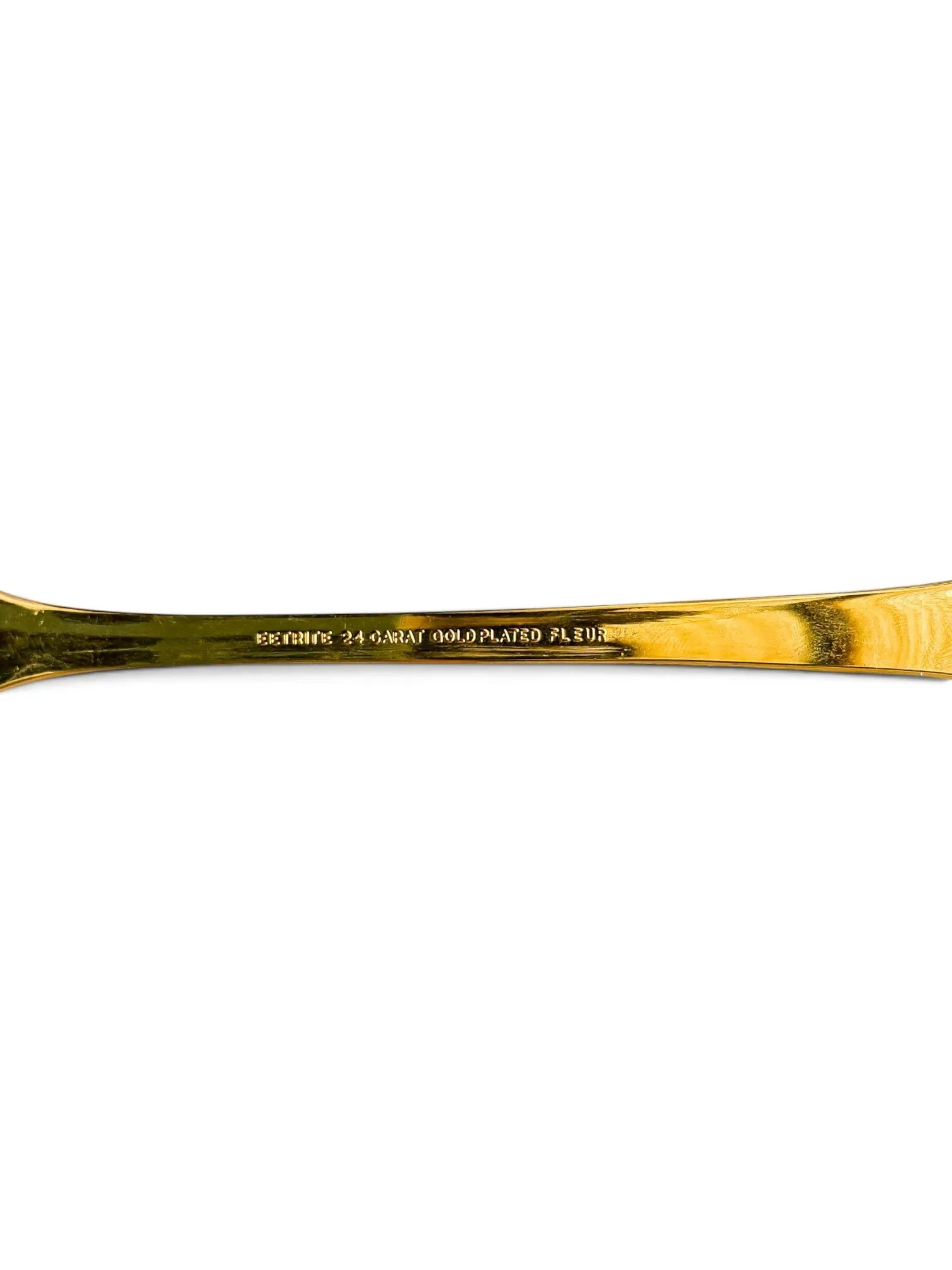Close-up of the reverse handle stamp reading Eetrite 24 Carat Gold Plated Fleur