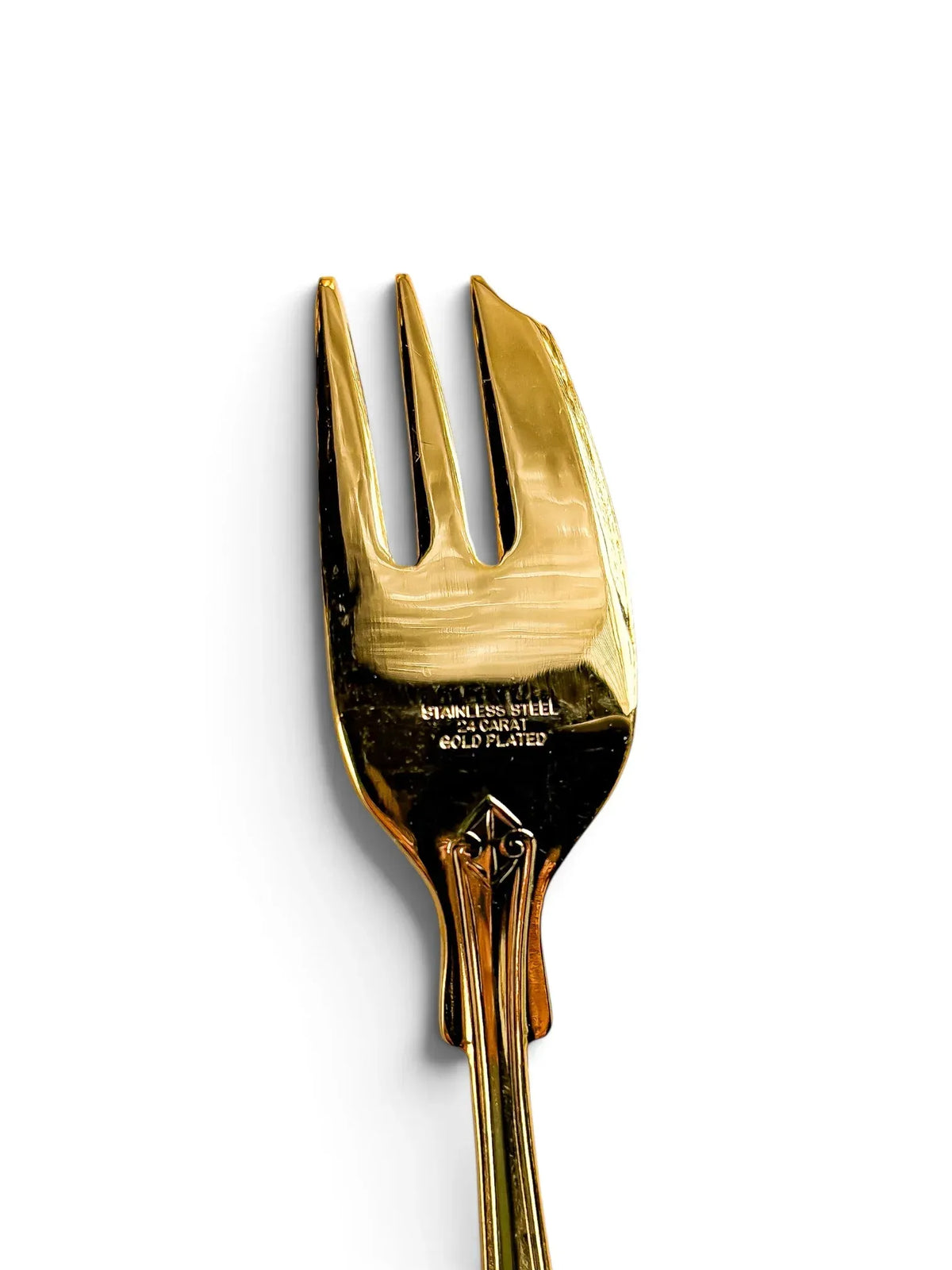 Reverse stamp reading Stainless Steel 24 Carat Gold Plated on a vintage pastry fork