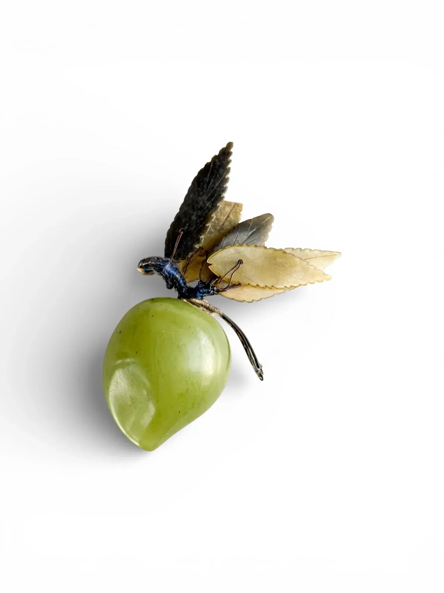 Vintage green stone fruit with metal leaves, collectible tabletop decor on white background