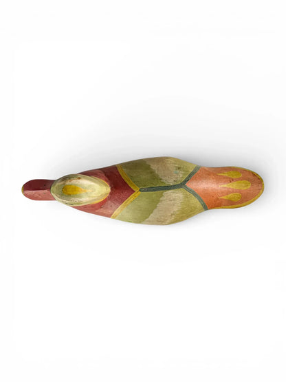 Hand-painted wooden duck sculpture with colorful vintage finish on white background