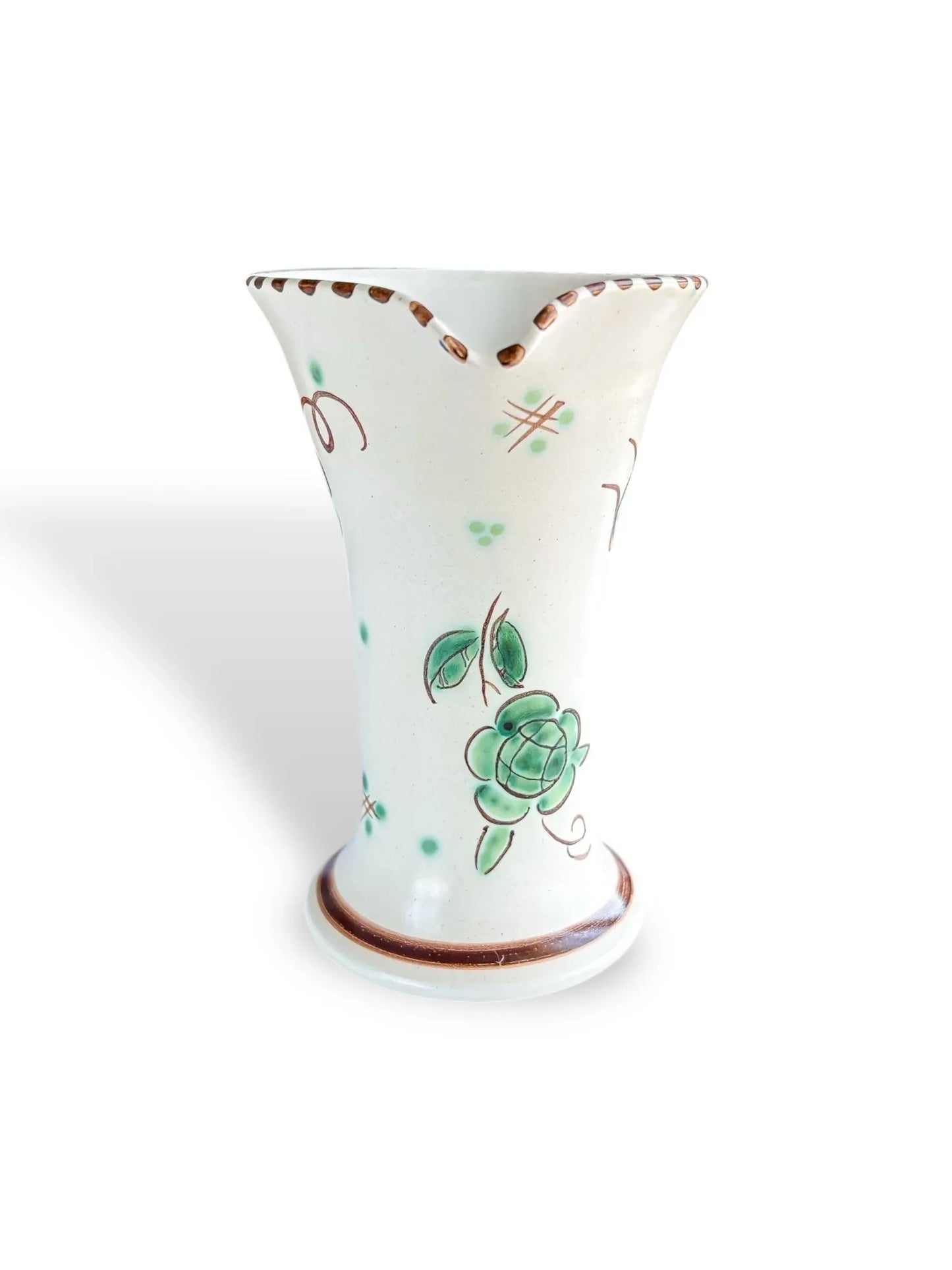 White ceramic vase with flared rim, green floral and brown decorative accents, isolated on white