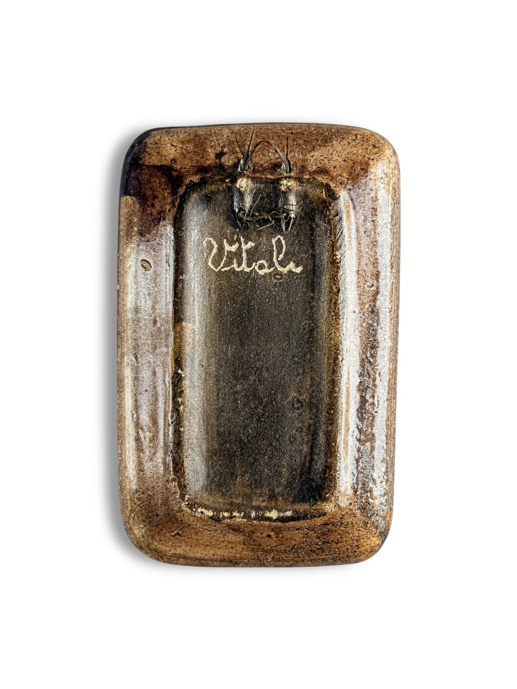 Rectangular vintage brown ceramic plaque with glossy finish and 'Vitala' written in cursive on back