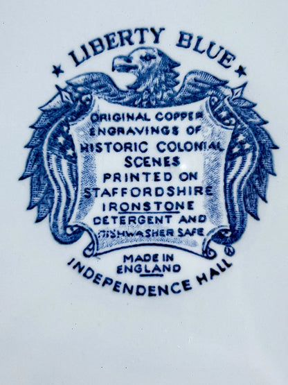Close-up of the Liberty Blue backstamp with an American eagle, reading "Original Copper Engravings of Historic Colonial Scenes, Made in England, Independence Hall."