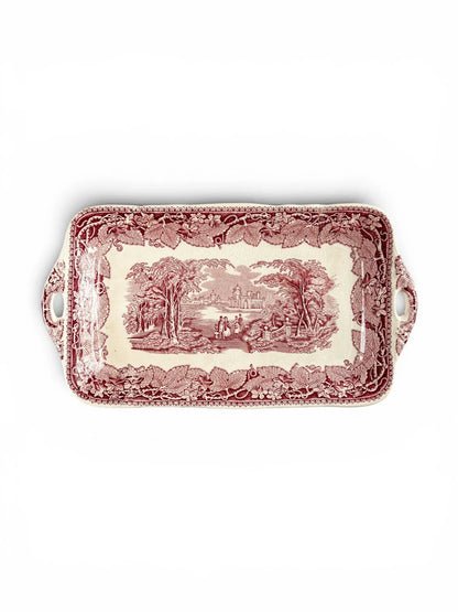Full front view of a vintage Mason’s Vista red transferware serving tray with integrated handles and an English country estate scene.