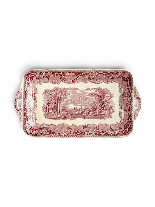 Full front view of a vintage Mason’s Vista red transferware serving tray with integrated handles and an English country estate scene.