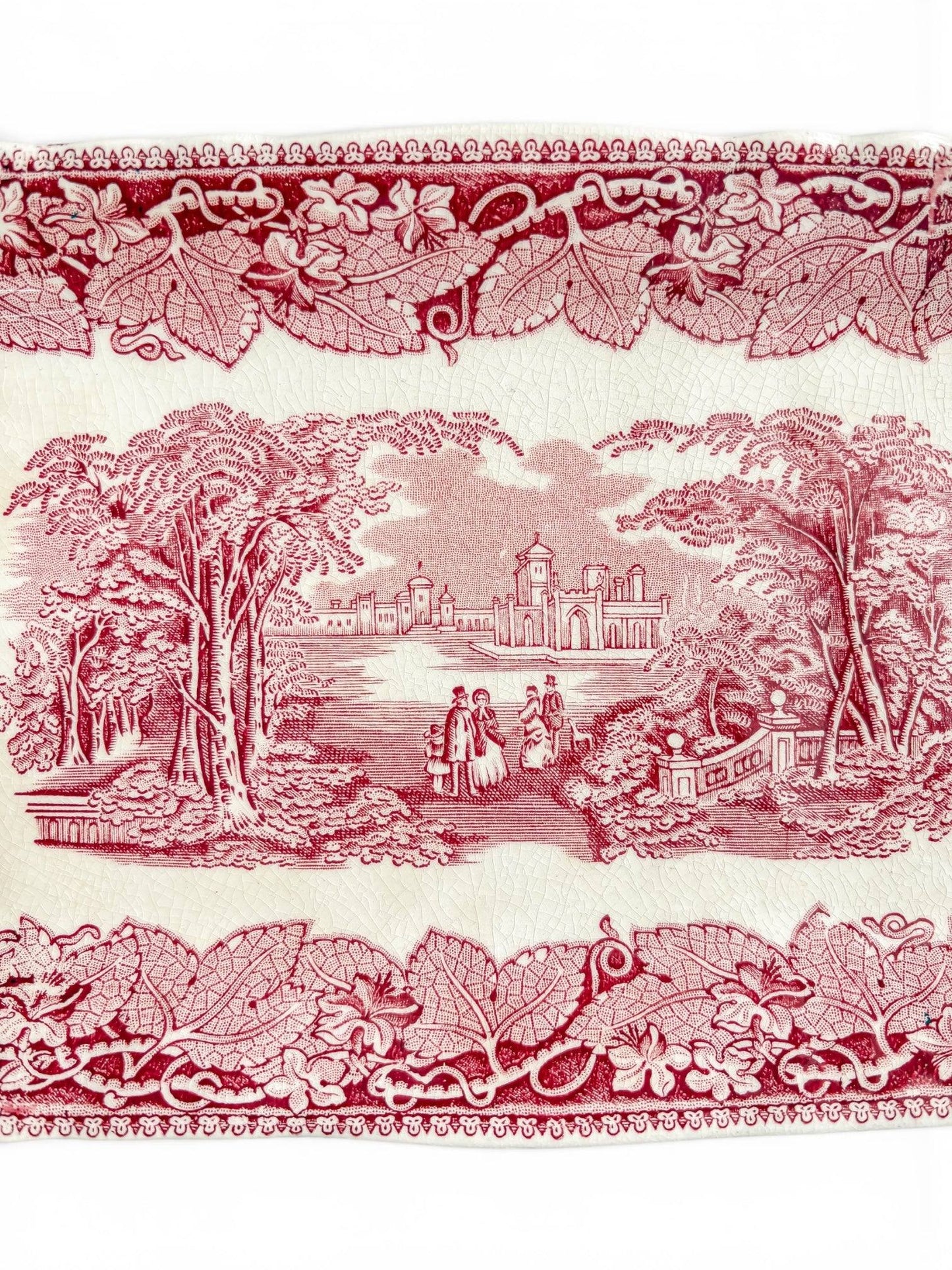 Close-up of the Mason’s Vista tray showing the detailed claret-red landscape transfer, floral border, glaze crazing and age-related staining.