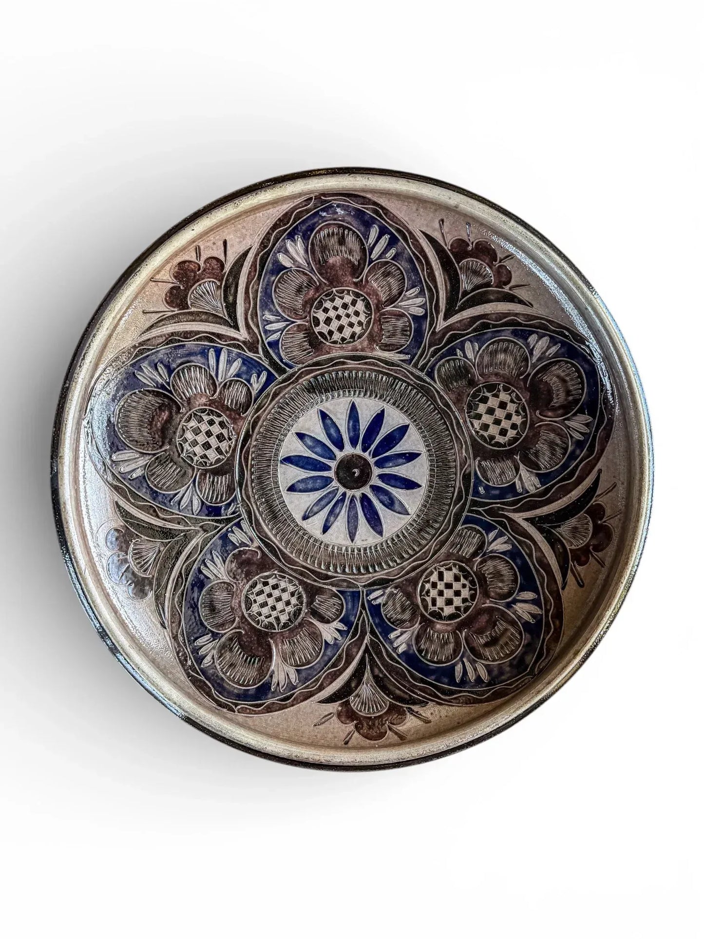 37cm Geschwister Bahn sgraffito floral charger in blue and manganese salt-glazed stoneware.