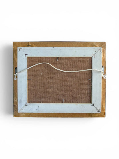 The reverse side of the framed H. Mommen oil painting against a solid white background. The back features a brown canvas board backing secured into a sturdy painted white wooden inner frame, complete with a neatly tied white hanging cord attached across the centre.