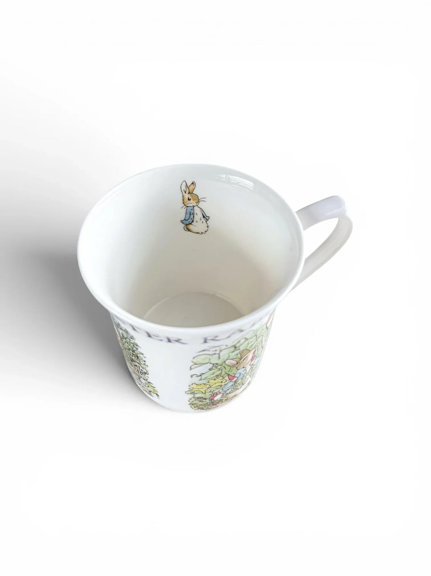Small Peter Rabbit illustration detail on the inside rim of a fine bone china mug.