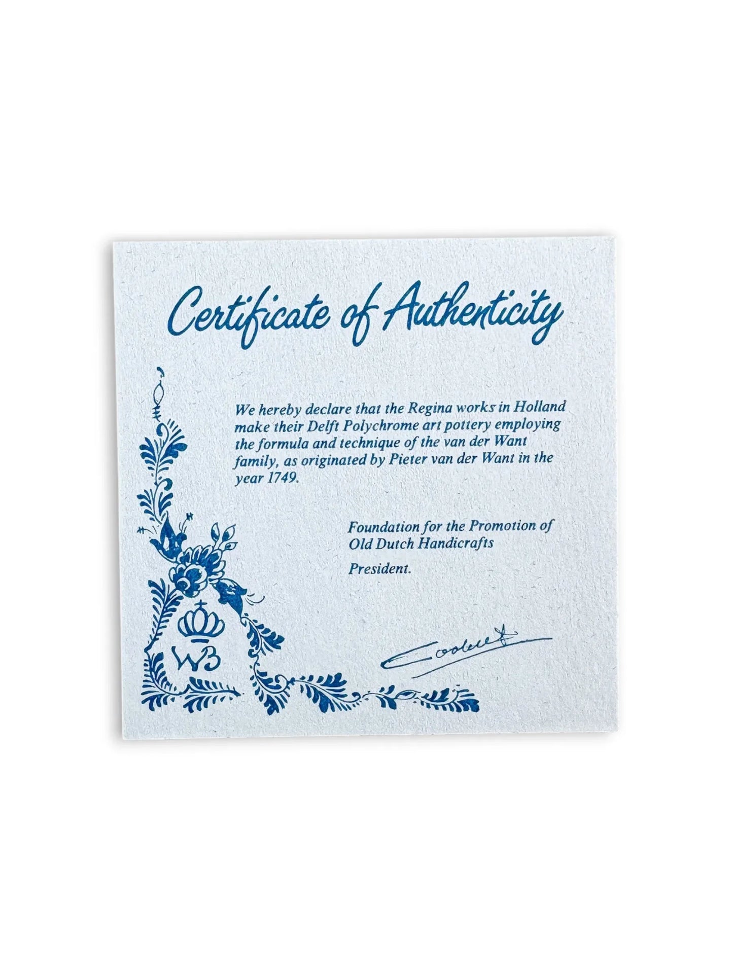 Official Certificate of Authenticity for Regina Delft Polychrome art pottery, citing the van der Want family heritage since 1749 and the Foundation for the Promotion of Old Dutch Handicrafts.