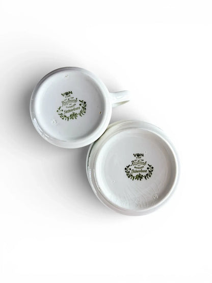 Underside of the creamer and sugar bowl showing the Rörstrand "Made in Sweden" backstamps and VDN codes.