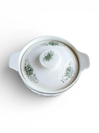 High-angle view of the Grön Anna tureen with its lid, highlighting the symmetrical green Neo-Rococo floral clusters and the central lid knob.