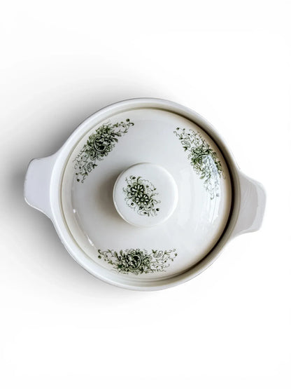 High-angle view of the Grön Anna tureen with its lid, highlighting the symmetrical green Neo-Rococo floral clusters and the central lid knob.
