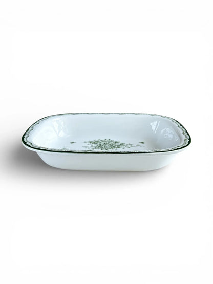 Side profile of the Grön Anna serving dish highlighting its 4.6 cm depth and scalloped decorative rim.