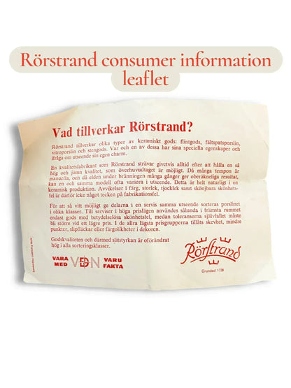 A vintage Rörstrand paper leaflet in Swedish titled "Vad tillverkar Rörstrand?" (What does Rörstrand produce?), explaining the artisanal nature of their ceramics and the unique, manual variations that occur during the firing process.