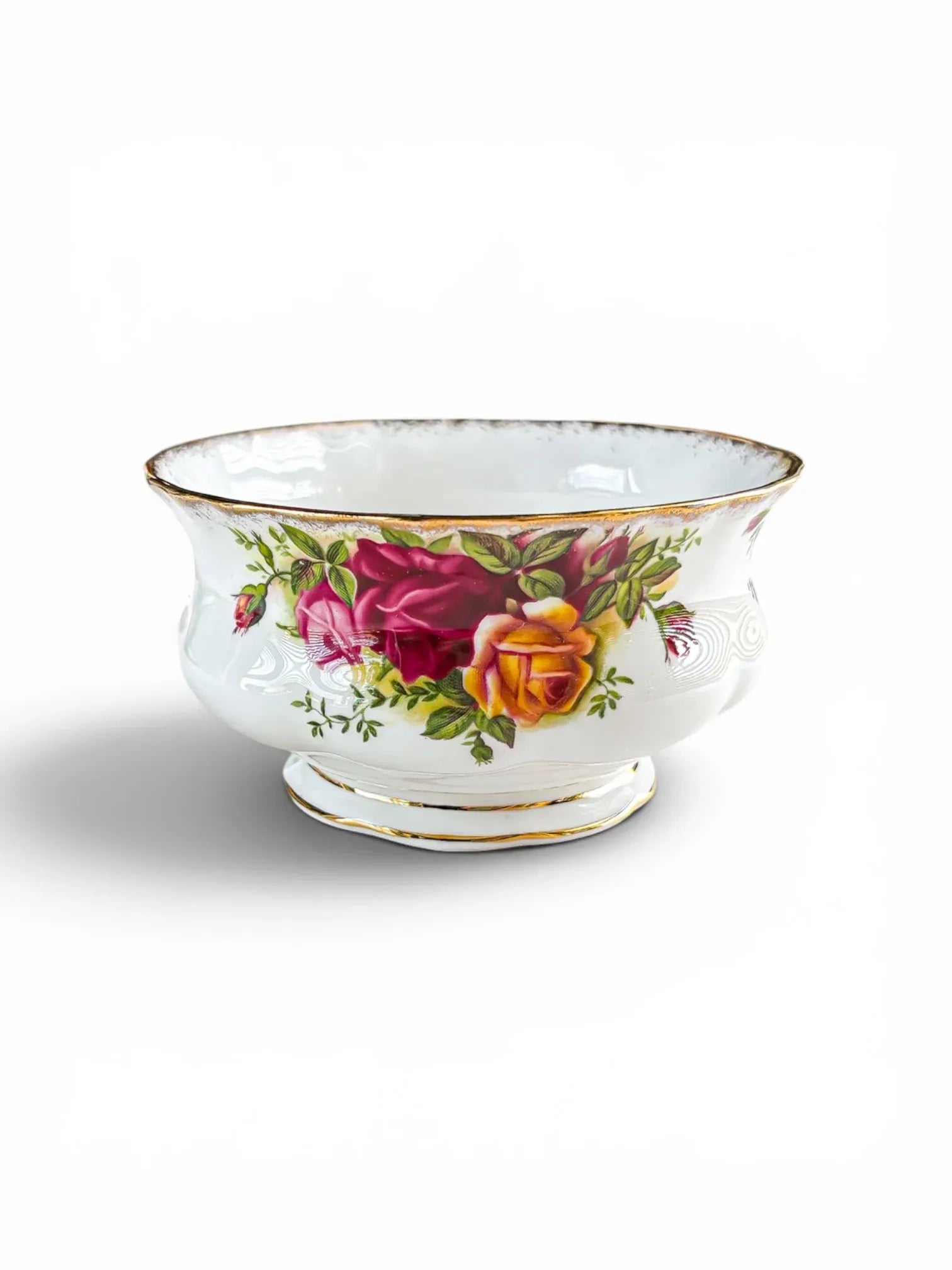 Front view of a vintage Royal Albert Old Country Roses open sugar bowl against a white background, highlighting the footed Montrose shape and detailed pink and yellow rose transfers.