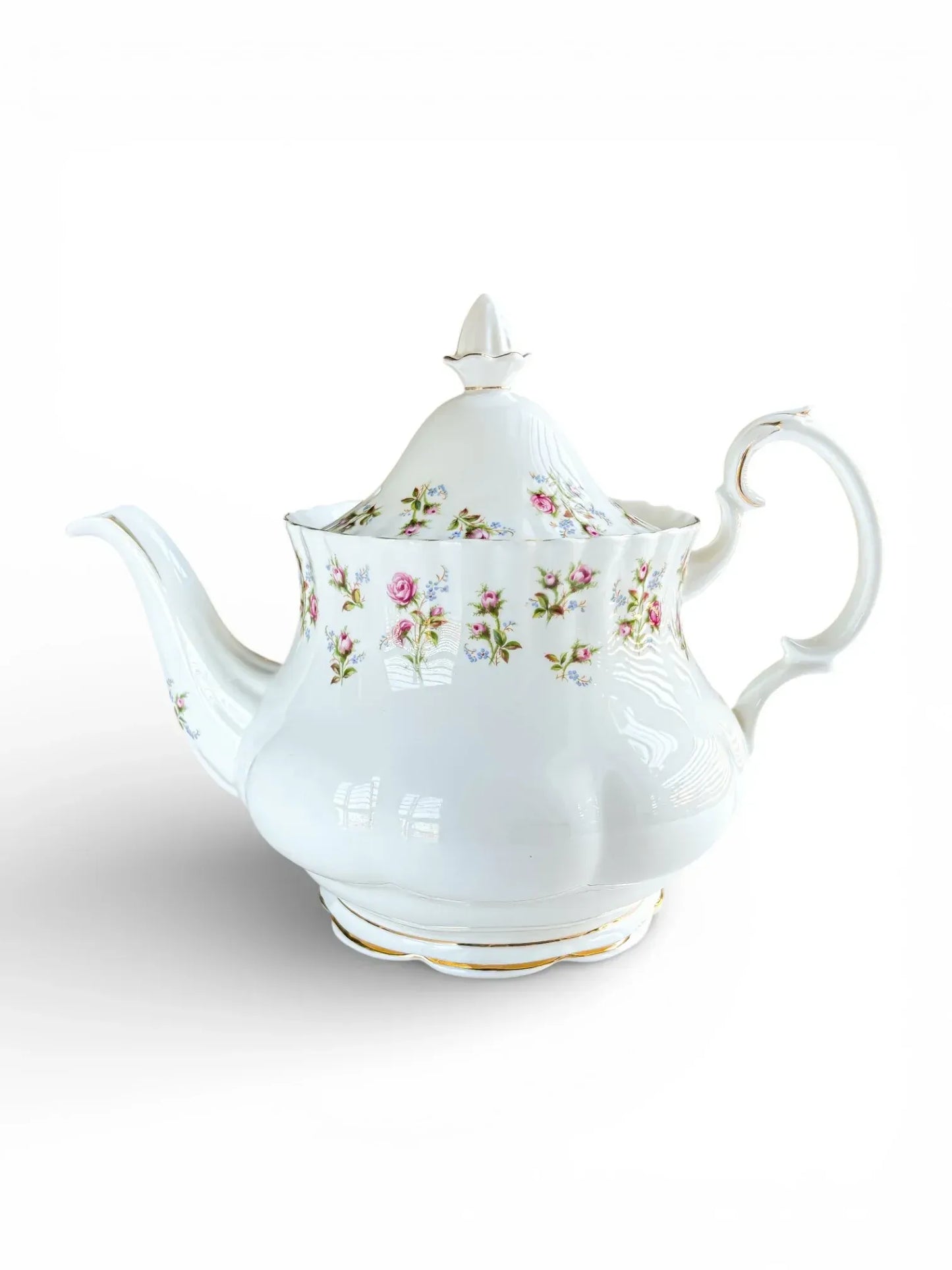 Large Royal Albert Winsome bone china teapot on the Montrose shape featuring pink rose sprays and a scrolled handle.
