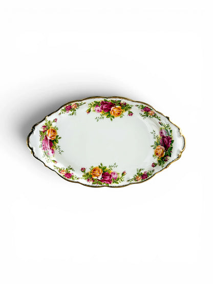 Full top-down view of the oval Royal Albert Old Country Roses serving tray, showcasing the wide porcelain face, scalloped edge, and twin moulded handles.