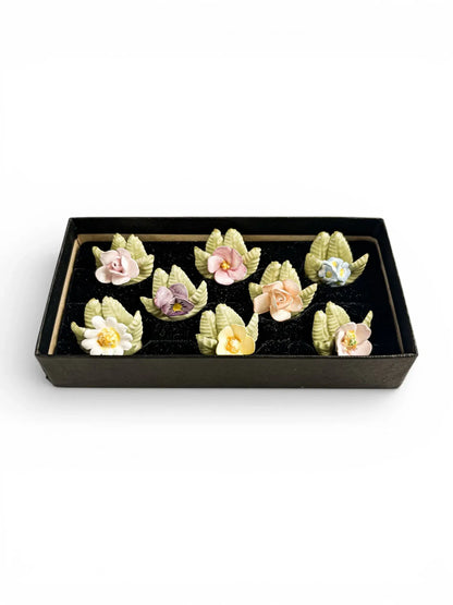 Complete set of 8 vintage English fine bone china floral place card holders in original black presentation box.