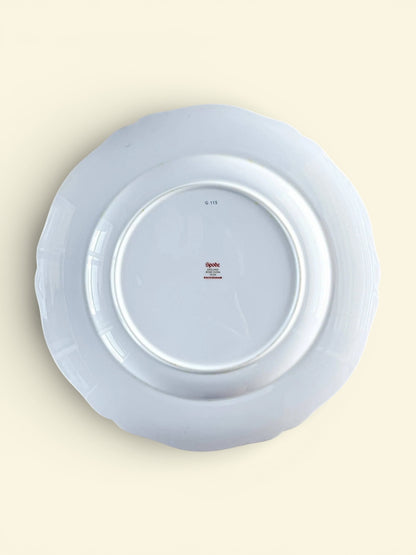 Back view of a white Spode bone china porcelain plate with scalloped edges and manufacturer markings