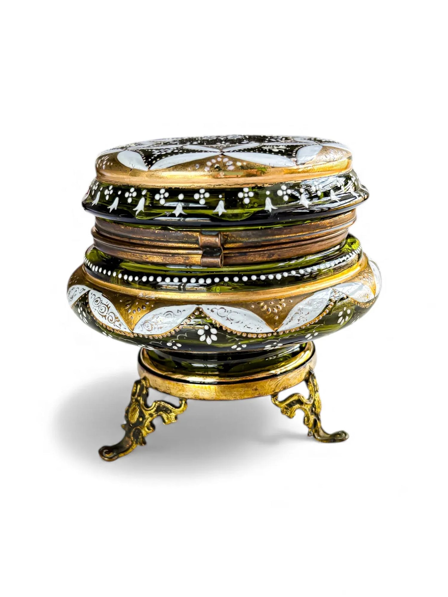 Antique green glass trinket box with gold and white enamel, ornate brass feet and clasp