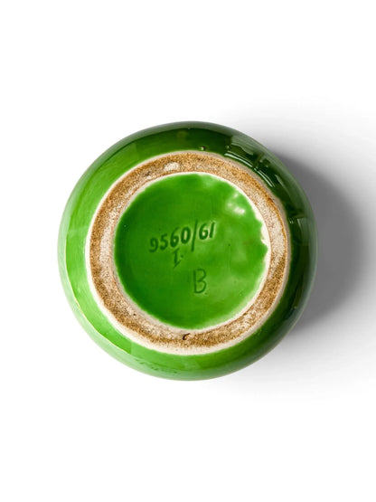 Base of a vintage green ceramic pomegranate vase, with an unglazed foot ring and the impressed factory code B, 1. and 9560/61.