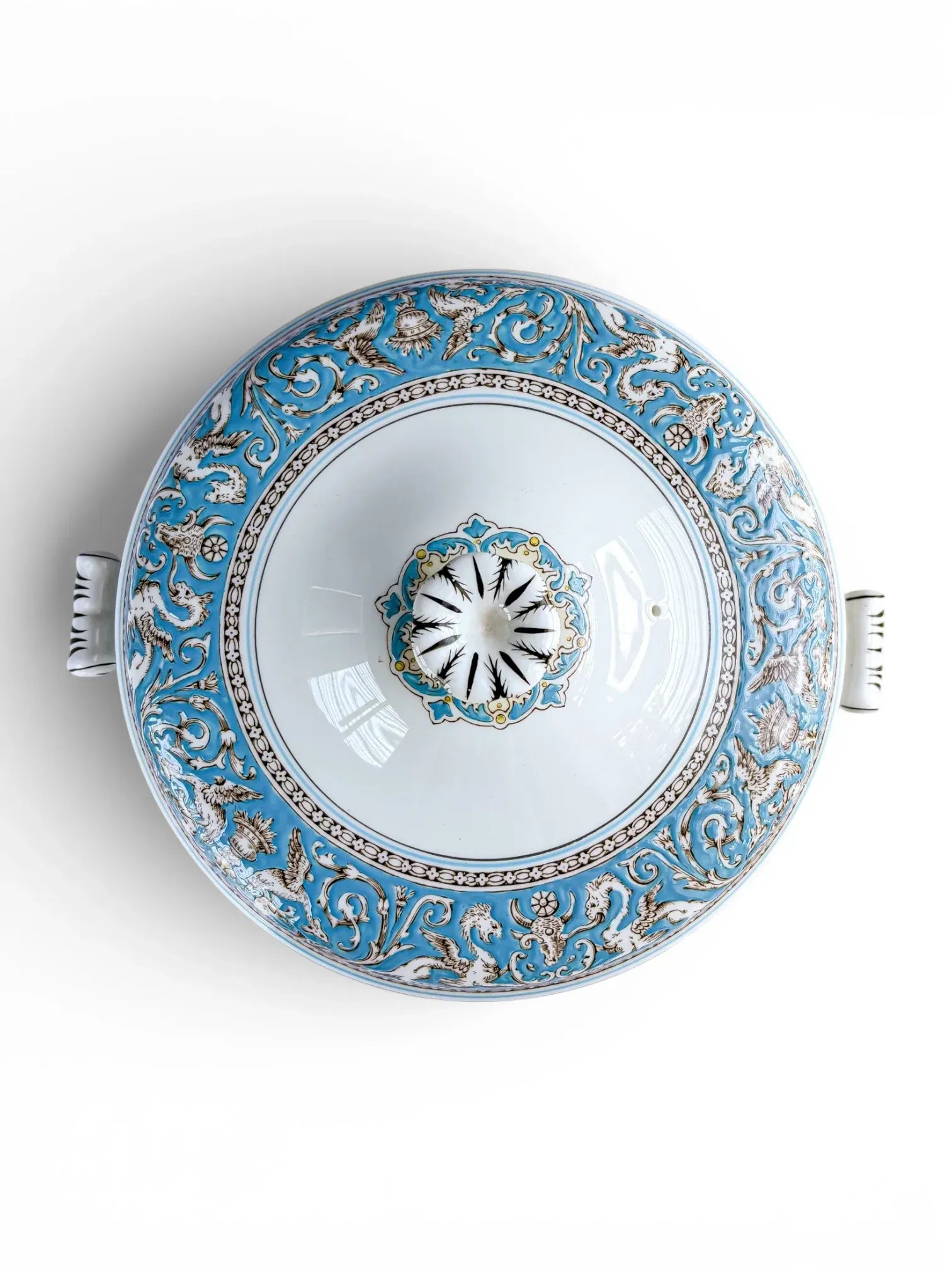 Top-down view of Wedgwood Florentine Turquoise W2714 tureen lid showing the white centre and turquoise griffin border.