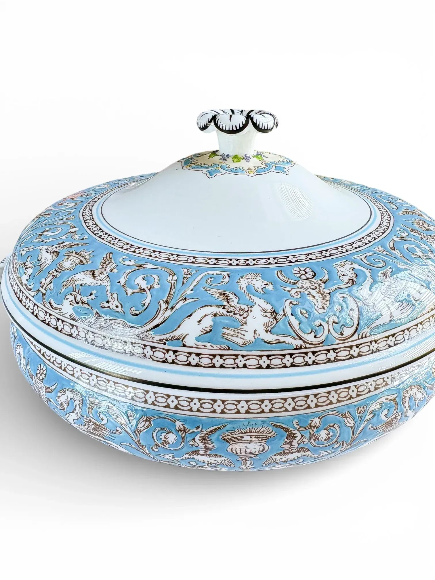 Perspective view of a vintage Wedgwood Florentine Turquoise vegetable tureen showcasing the Leigh shape.