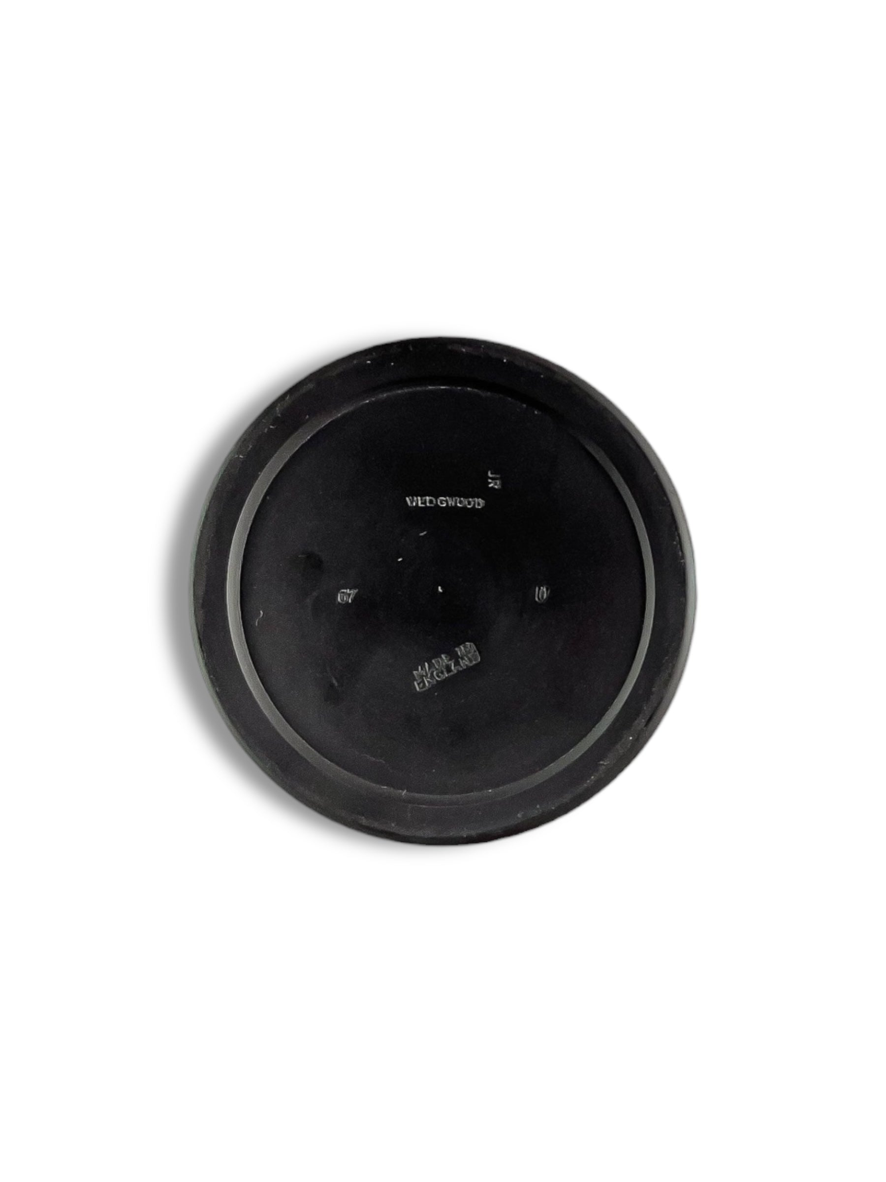 Bottom view of black Wedgwood ceramic plate marked Made in England with stamped details